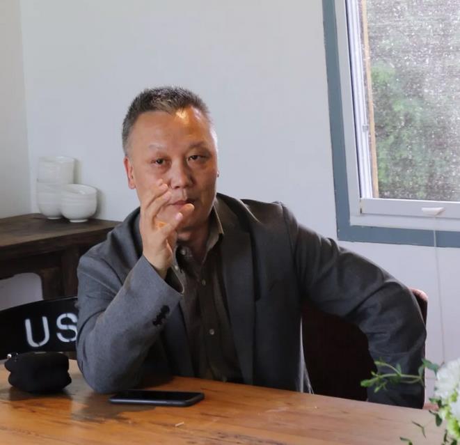 余功保先生应邀参加活动,并在座谈会上发言