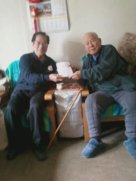 2014 03 10孙长立赠书周世勤