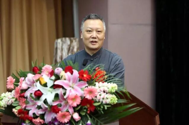 (余功保出席研讨会并发表演讲)